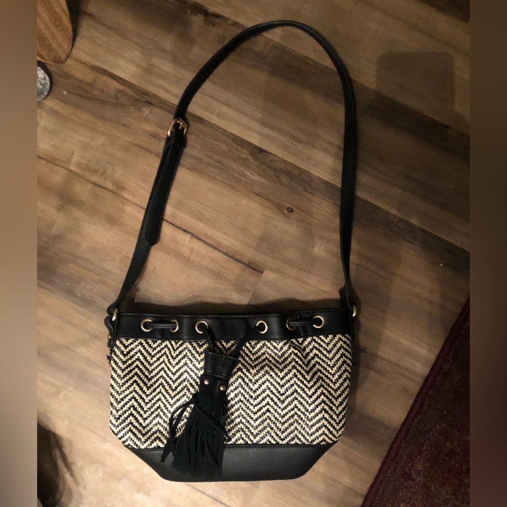 Cream and black tassel purse